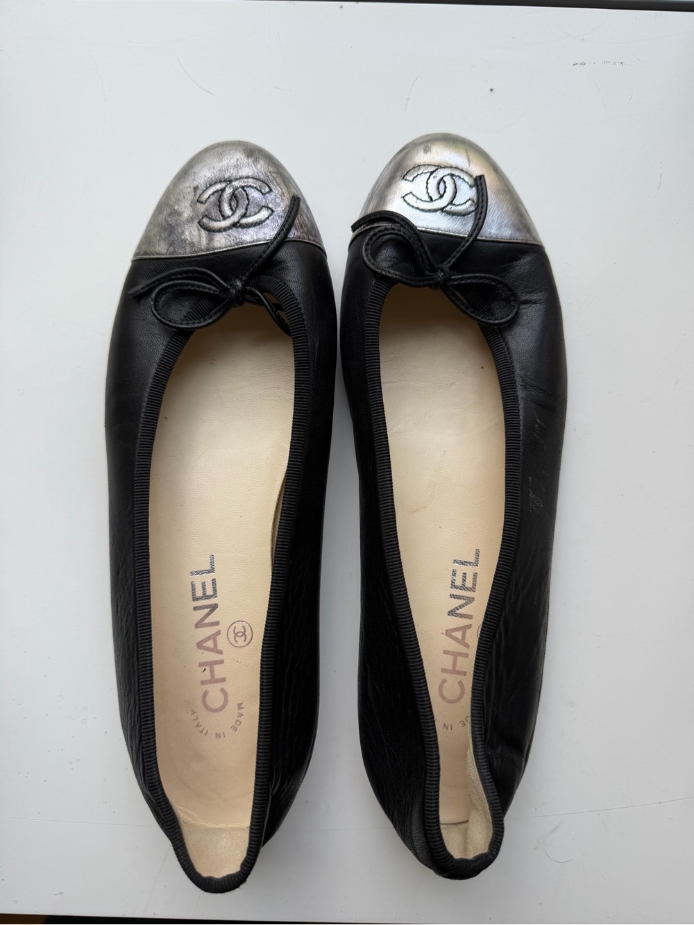 CHANEL Black Leather Ballet Flats with Silver Cap Toe